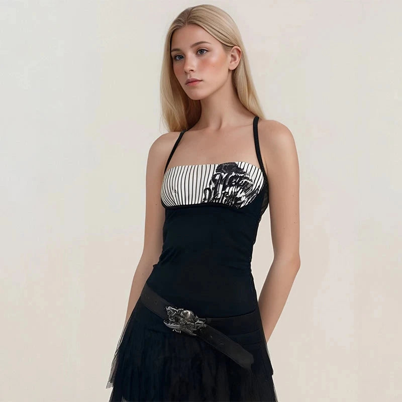 Chic halter neck vintage inspired black camisole top with a striped pattern, made from lightweight polyester fabric.