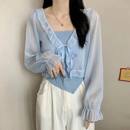 Chic ruffled chiffon cape with long sleeves, lightweight polyester blend, open stitch design, and regular fit.