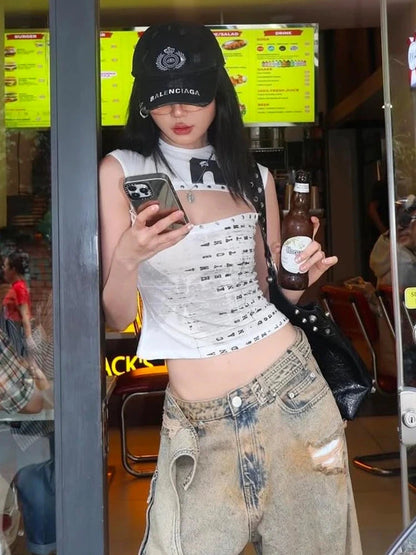 Hollow out letter print tank top in cropped length with a regular fit, made from a polyester and spandex blend.