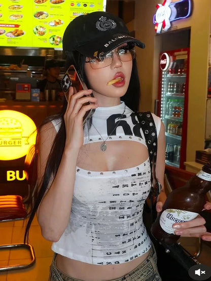 Hollow out letter print tank top in cropped length with a regular fit, made from a polyester and spandex blend.