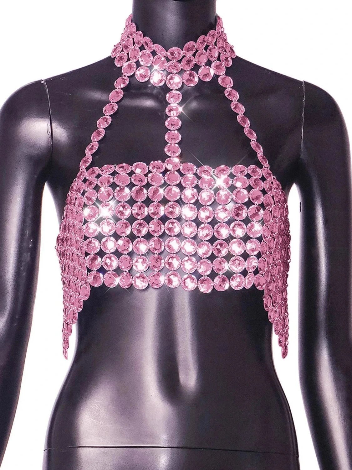 Silver halter tank top with glittering sequin detail and backless design, perfect for clubwear and festive occasions.