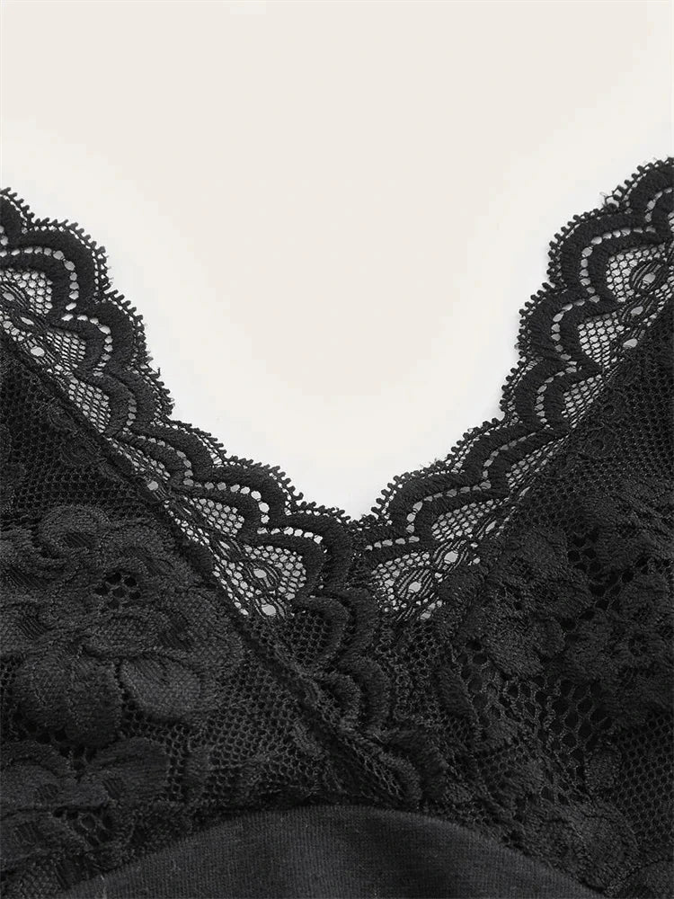 Black lace patchwork halter top with ruched back and sleeveless design, made from a polyester blend.