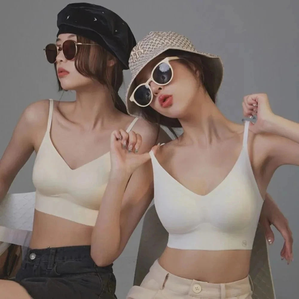 Backless triangle cup bra with U-shaped back design, adjustable straps, and thin molded cups for comfort.