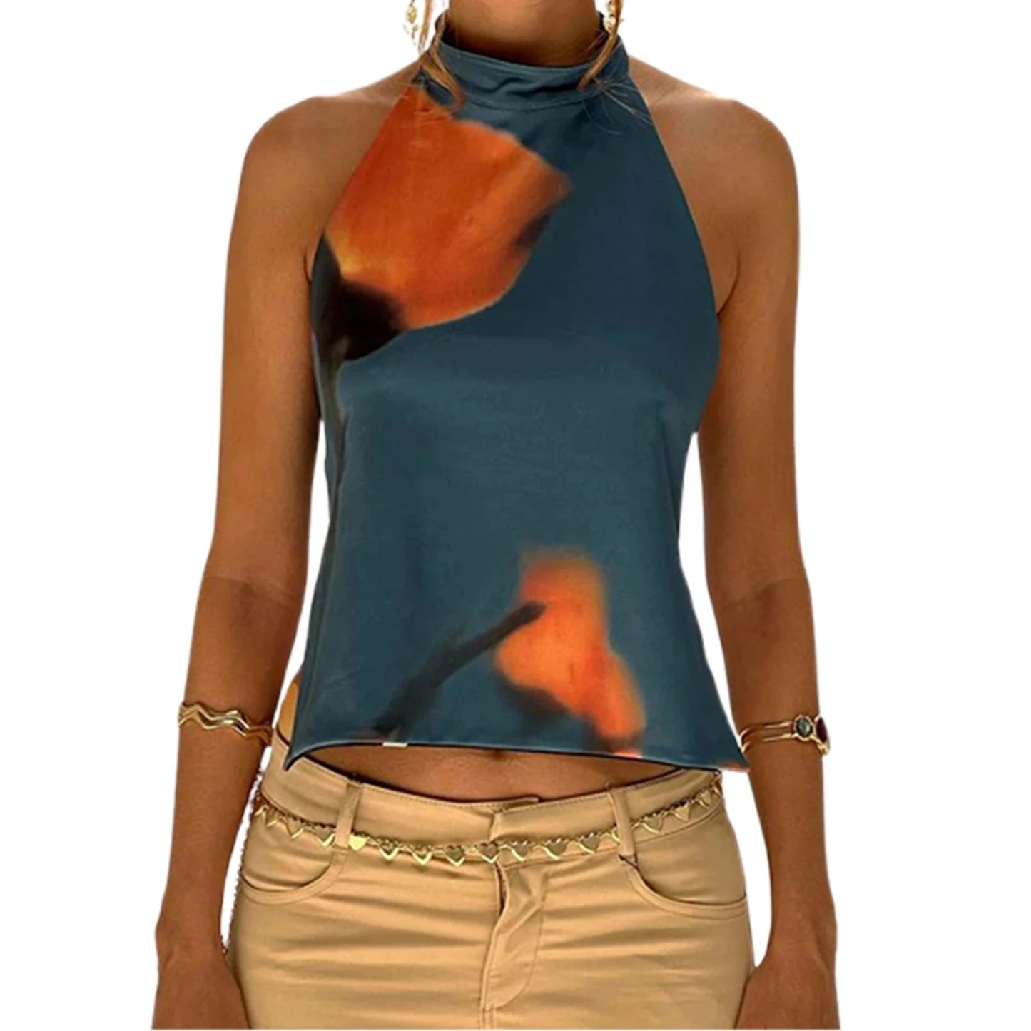 Elegant sleeveless halter top with polka dot print in a cotton polyester blend. Regular length with slight stretch.