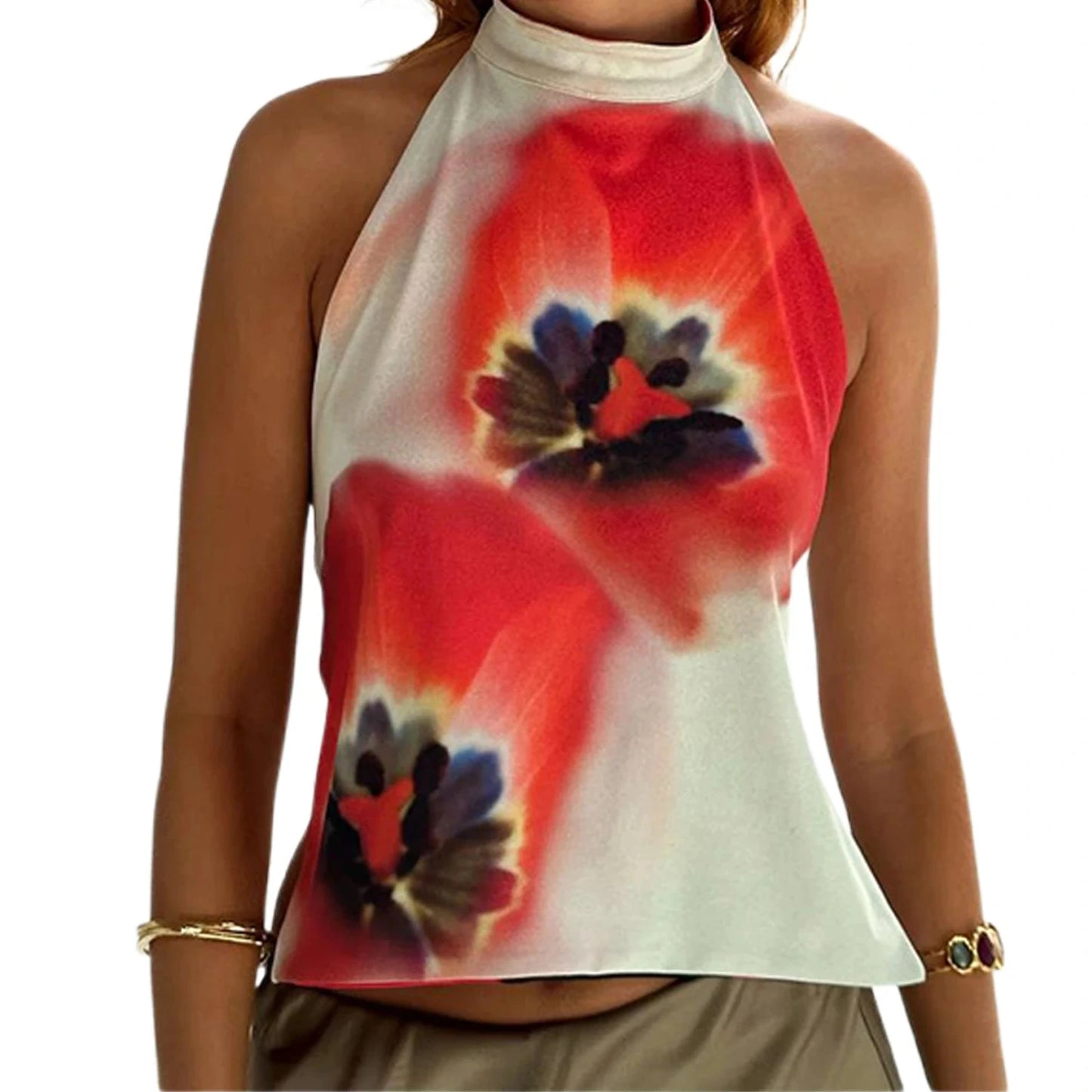 Elegant sleeveless halter top with polka dot print in a cotton polyester blend. Regular length with slight stretch.