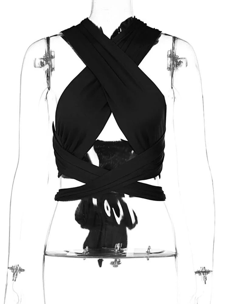 Halter neck backless crop top in midnight black with a cut-out design and high stretch for comfort.