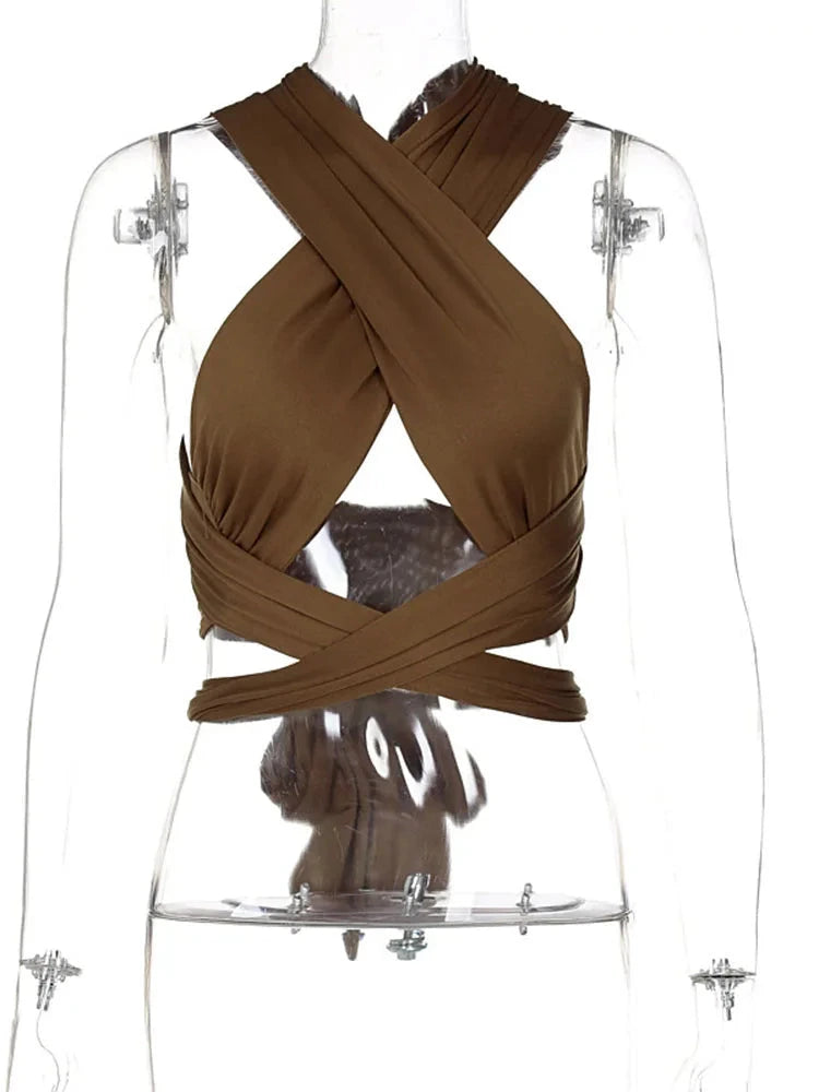 Halter neck backless crop top in chocolate brown with cut-out design and high stretch for comfort.