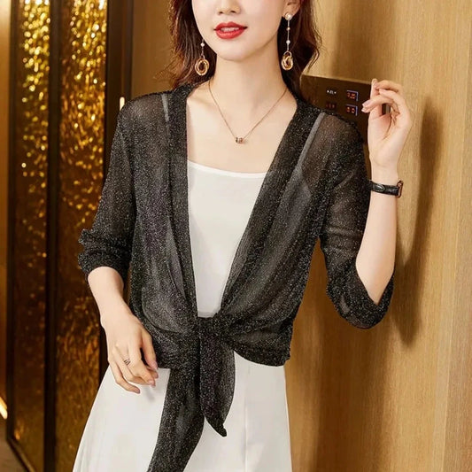 Glitter tie-up open front shrug with three-quarter sleeves and lightweight cotton blend for summer layering.