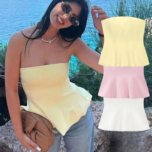 Butter yellow ruffled cami top with a strapless silhouette and short length, made from lightweight polyester.