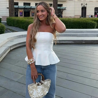 Butter yellow ruffled cami top with a strapless silhouette and lightweight polyester fabric. Ideal for summer outings.