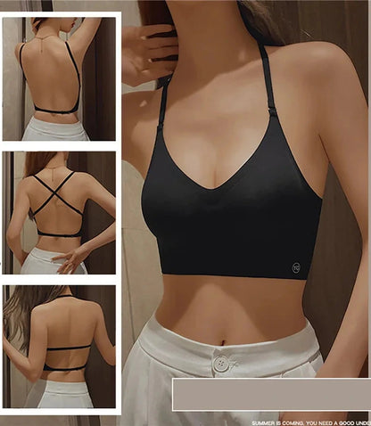 Backless invisible push-up bra with adjustable straps and seamless design for a smooth silhouette under low-cut tops.