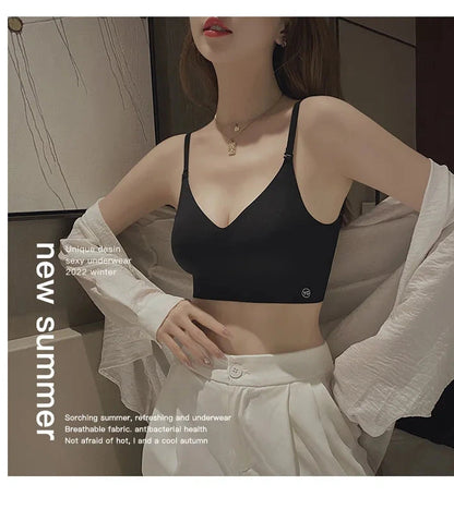 Backless invisible push-up bra with adjustable straps and seamless design for a smooth silhouette under low-cut tops.