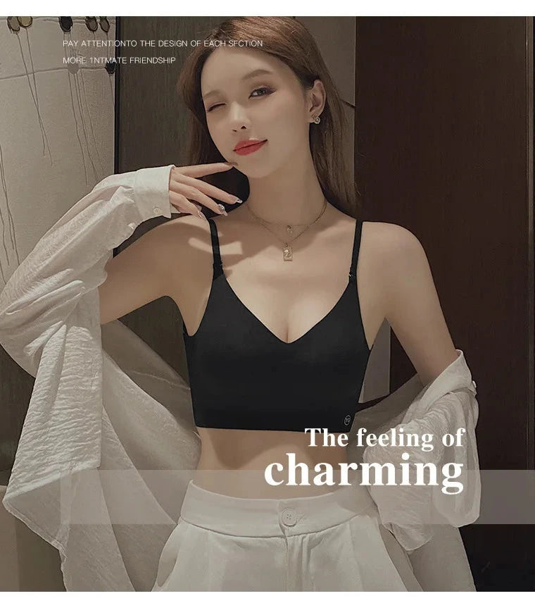 Backless invisible push-up bra with adjustable straps and seamless design for a smooth silhouette under low-cut tops.