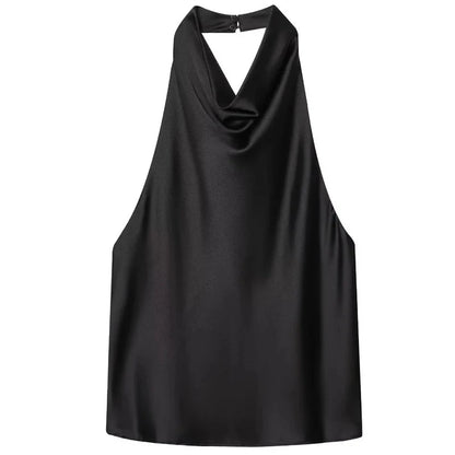 Black satin halter top with backless design, sleeveless silhouette, and slight stretch. Ideal for casual and beachwear.