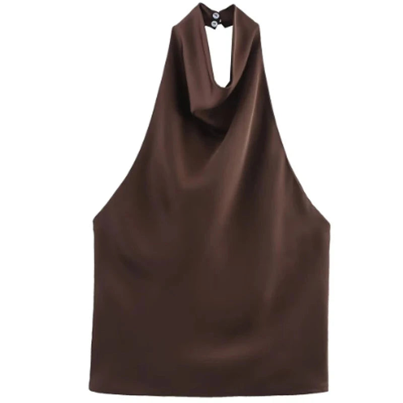 Satin halter top with backless design in black and yellow, featuring a short length and slight stretch.