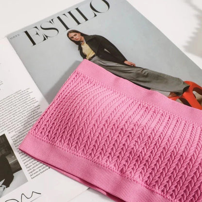 Seamless ribbed bandeau top with a flexible fit, crafted from a nylon and spandex blend for comfort and versatility.