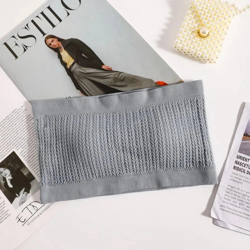 Sky gray seamless ribbed bandeau top with a flexible fit and strapless design, made from a nylon and spandex blend.