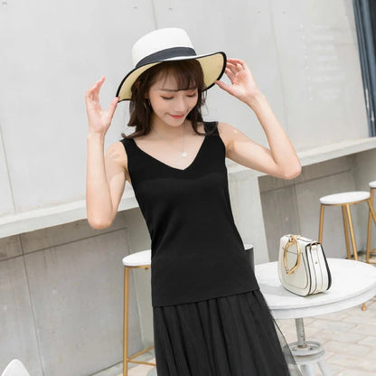 Refined backless padded V-neck tank top made from a soft nylon and viscose blend, ideal for casual wear or layering.