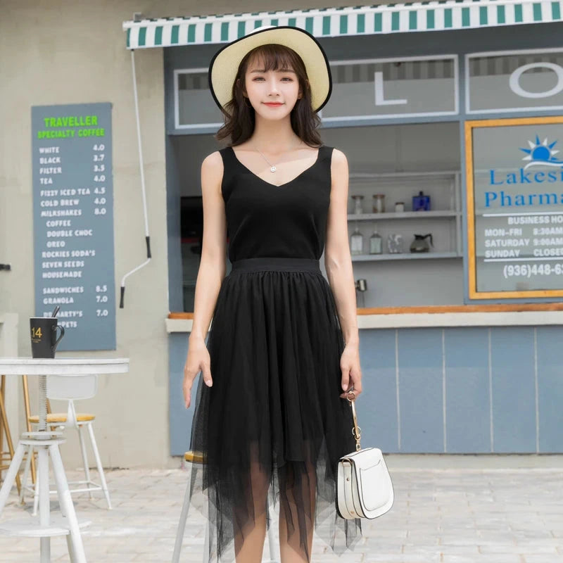 Refined backless padded V-neck tank top in a nylon and viscose blend, featuring medium stretch and regular length.