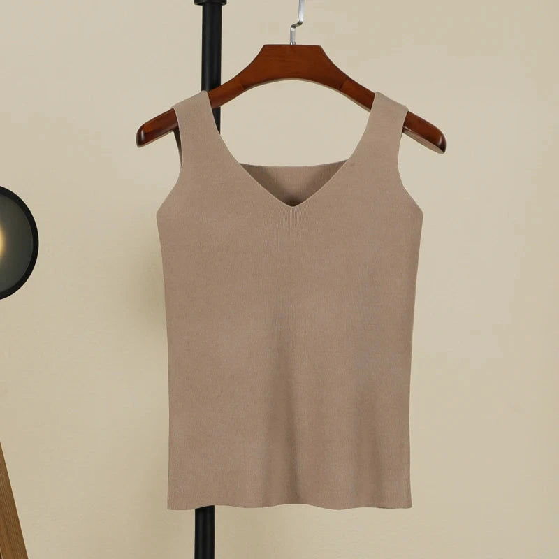 Sand beige backless padded V-neck tank top made from a nylon and viscose blend, featuring medium stretch and regular length.