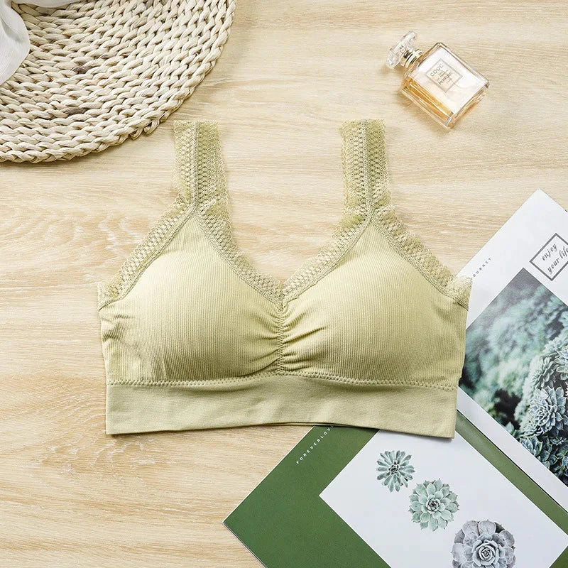 Pale yellow lace-trimmed cotton bandeau top with elegant back design. Ideal for layering or standalone wear.