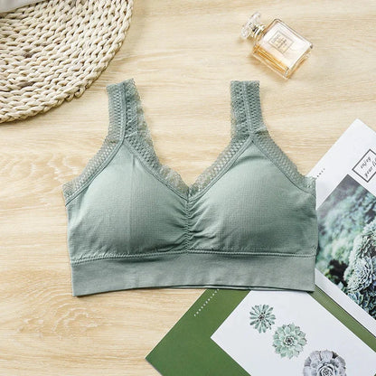Soft green lace-trimmed cotton bandeau top with elegant back design, perfect for layering or standalone wear.