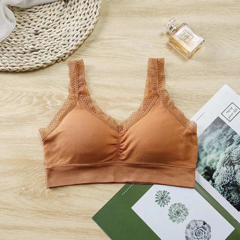 Lace-trimmed cotton bandeau top in rust orange with an elegant back design. Ideal for layering or standalone wear.