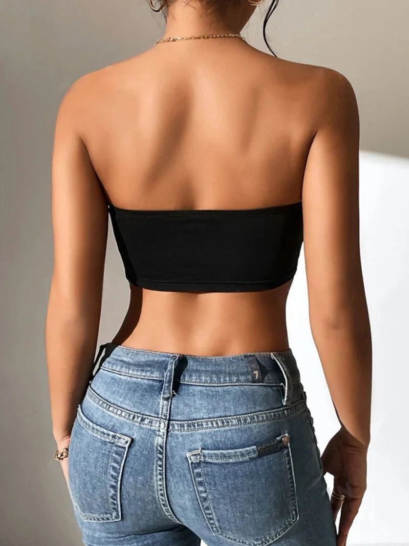 Solid color semi-sheer yoga bandeau crop top made from a polyester and spandex blend, featuring slight stretch.