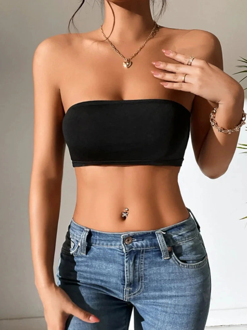 Solid color semi-sheer yoga bandeau crop top made from a polyester and spandex blend, featuring a minimalist design.