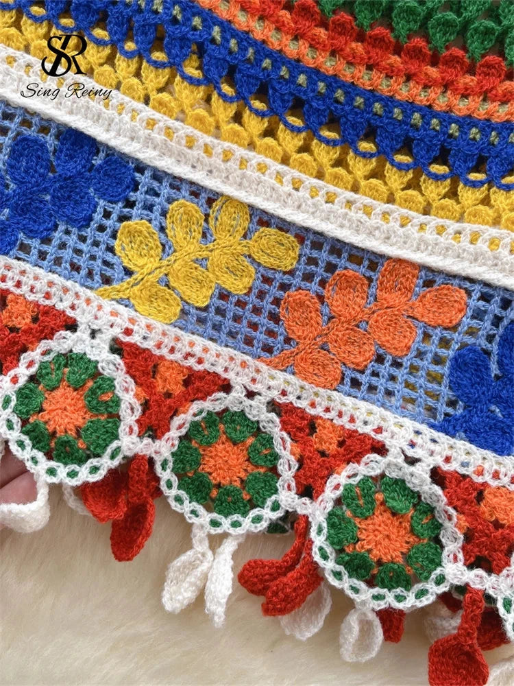 Bohemian rainbow knit tank top with hollow out detail and medium stretch for casual summer outings.