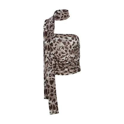 Leopard print tulle blouse with off-the-shoulder neckline and sleeveless design, ideal for casual summer outings.