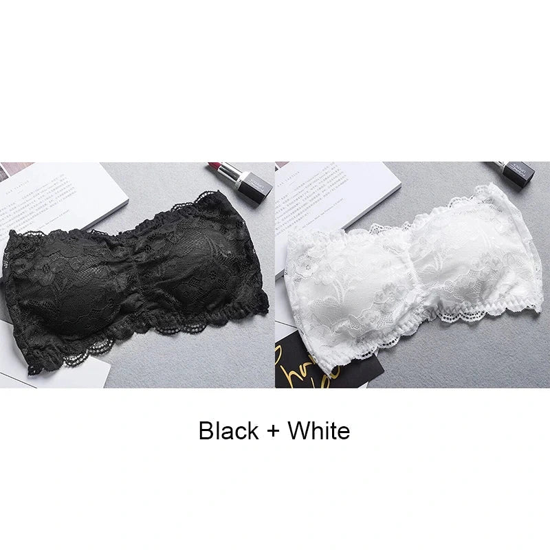 Black lace-trimmed bandeau top with invisible support and soft cups, made from nylon for a seamless fit.