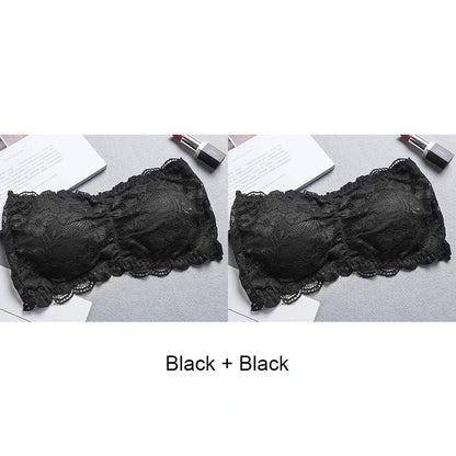 Black lace-trimmed bandeau top with invisible support and soft cups, made from nylon for a seamless fit.