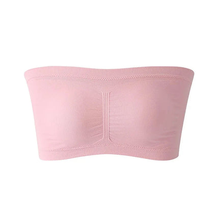 Soft pink seamless plus size strapless bra with removable cushions and stretchy nylon for a supportive fit.