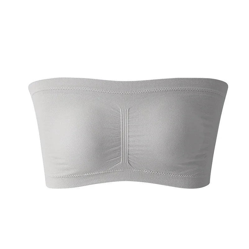 Light grey seamless plus size strapless bra with removable cushions and stretchy nylon for a supportive fit.