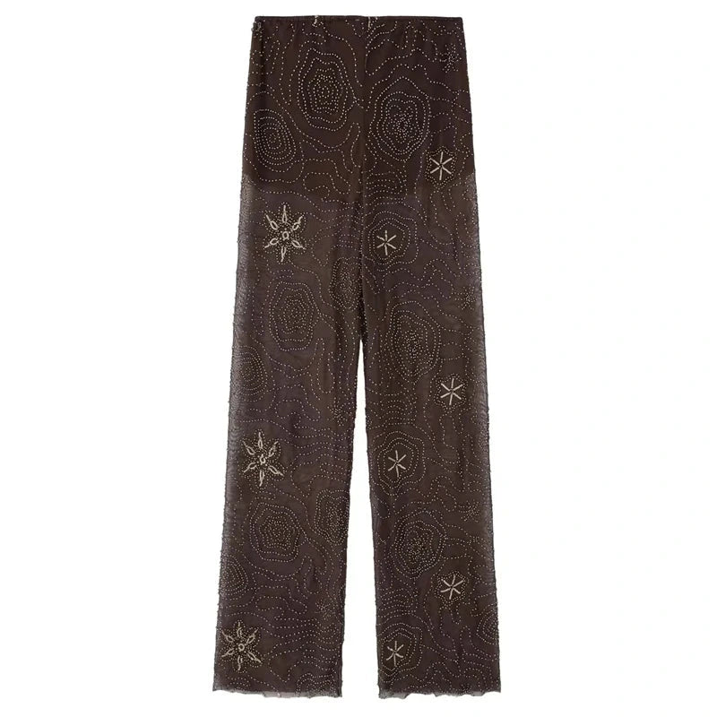 Patterned strapless tulle beaded corset crop top with backless design and semi-sheer fabric. Ideal for evening wear.