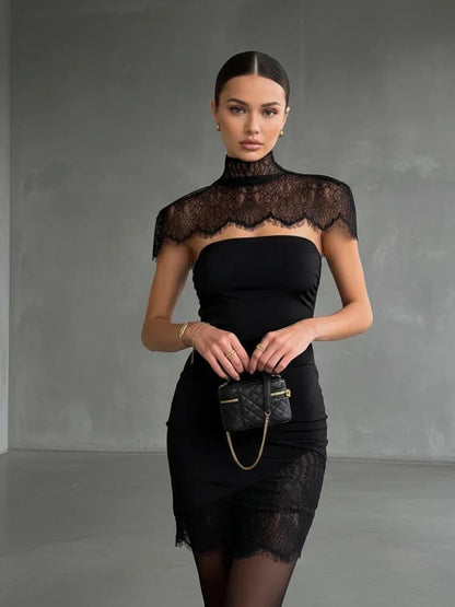 Elegant strapless maxi dress with cape shawl and lace detail, crafted from high-quality polyester.