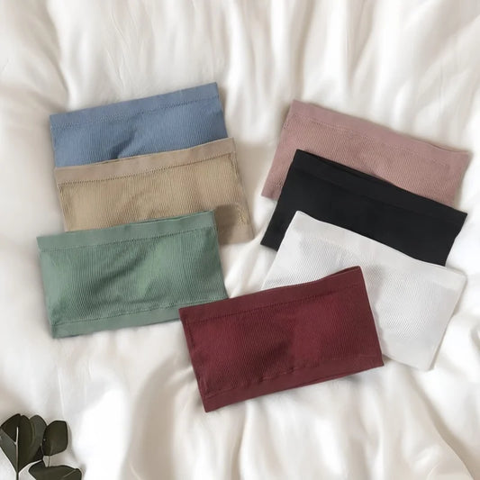 Grey nylon bandeau top with seamless construction and subtle stretch detailing.