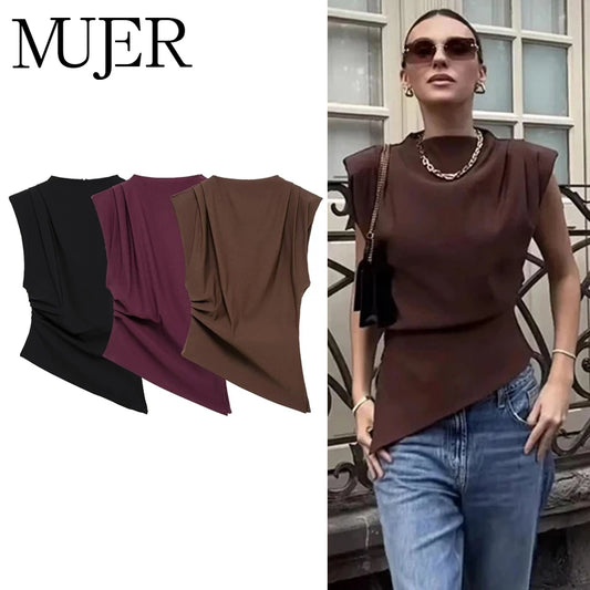 Asymmetrical high neck tank top with ruched detailing in a casual style. Made from blended polyester fabric.