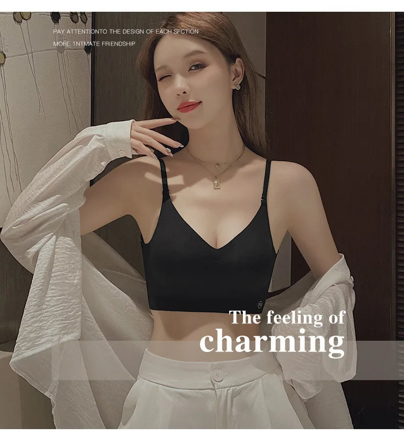 Backless invisible push-up bra with adjustable straps and seamless design for comfortable wear.