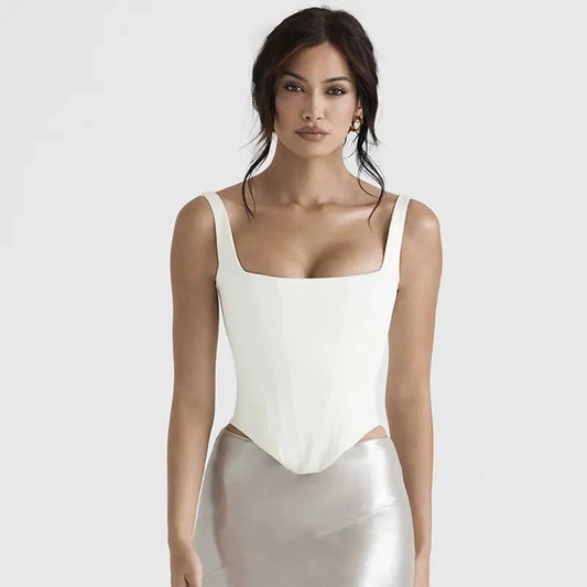 Cream beige backless halter neck stretch bandage top made from polyester and spandex.