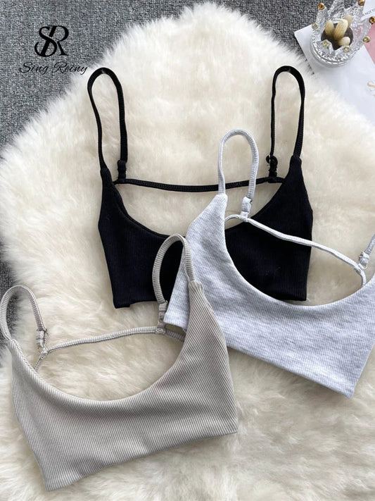 Backless camisole top with slim straps in a casual style, made from cotton and suitable for summer wear.